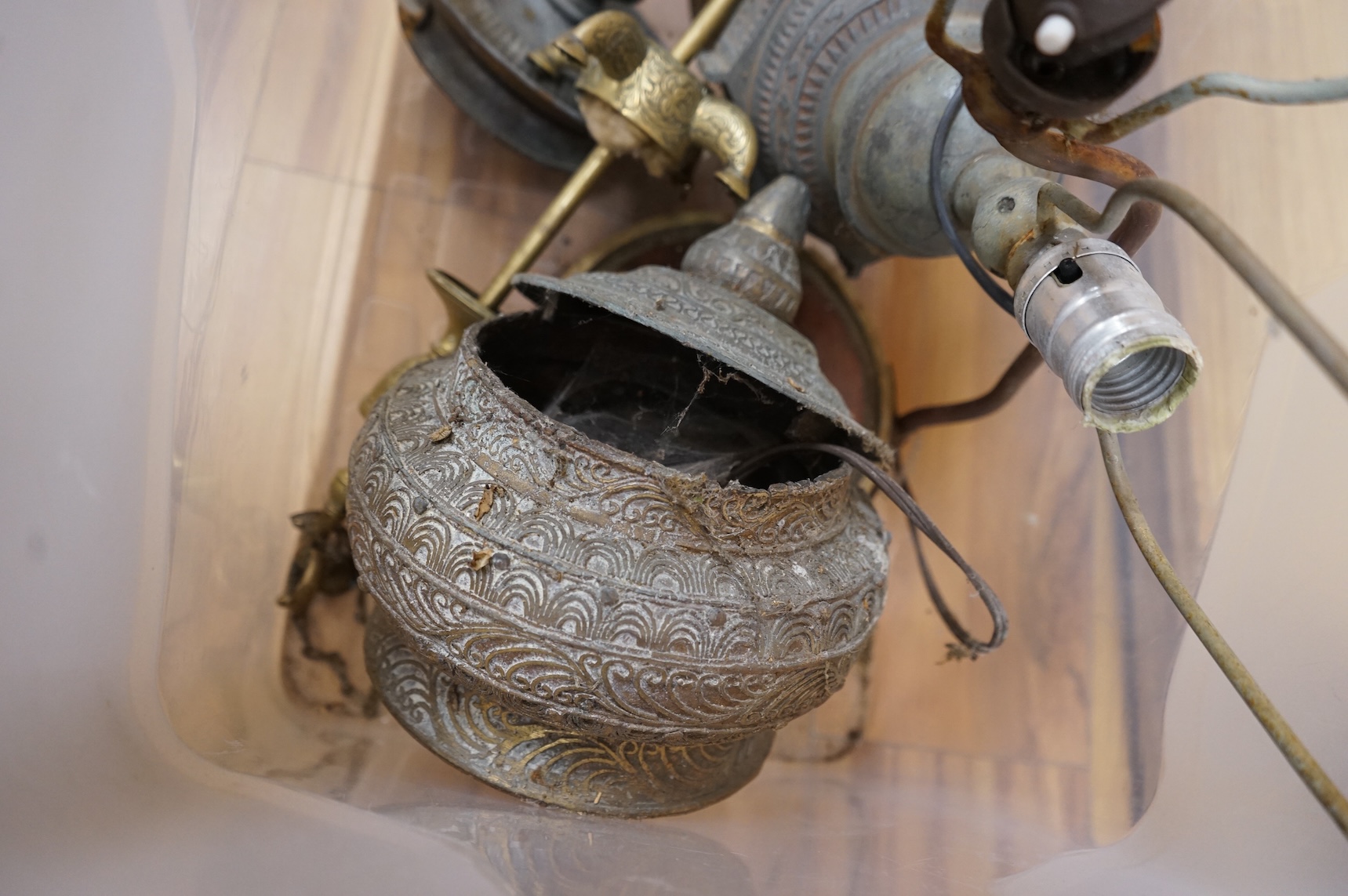 A collection mixed metal ware to include table lamps planters and a pestle and mortar
